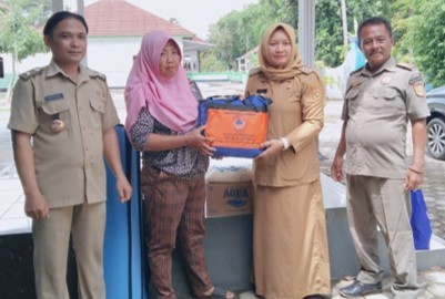 Pemberian Bantuan dari BPBD Kabupaten Purworejo Kepada Warga Terdampak Musibah di Desa Jenarkidul Kecamatan Purwodadi