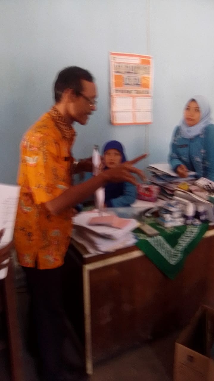 Montoring dan Evaluasi Kearsipan di Balai Desa Guyangan